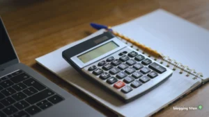 Documentary desk photograph used as the featured image for ai tools true annual cost - Blogging Titan
