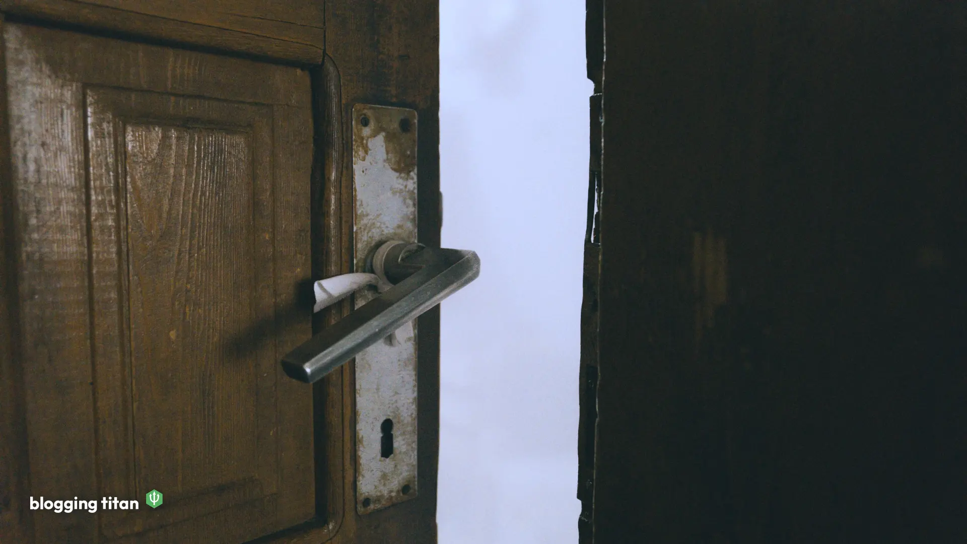 A wooden door standing slightly open, used as the featured image for our Cloudflare AI crawler change study - Blogging Titan