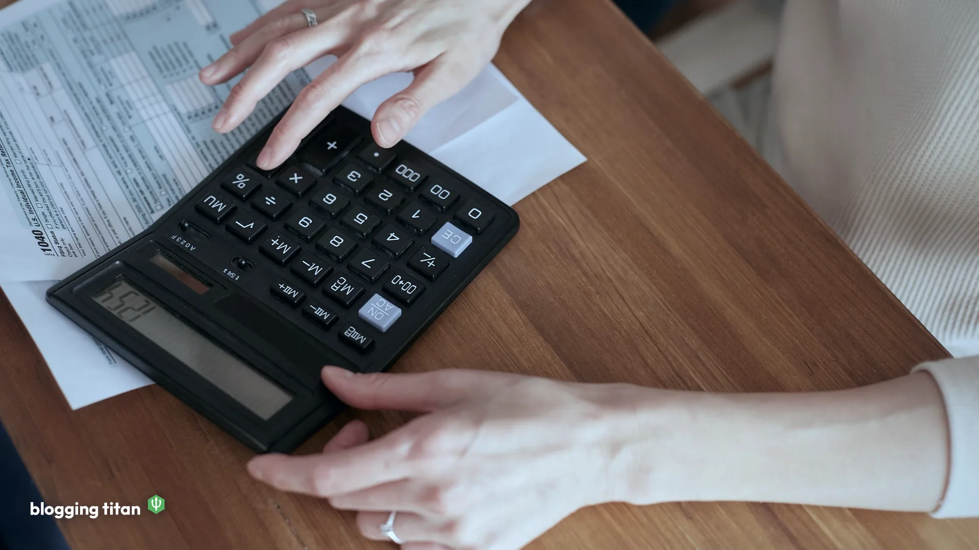 Documentary desk photograph used as the featured image for how to make money blogging - Blogging Titan