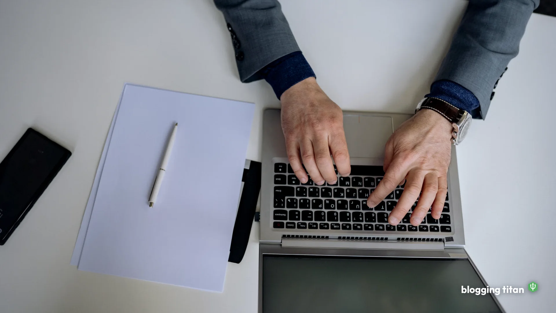 Documentary desk photograph used as the featured image for write seo friendly blog posts - Blogging Titan